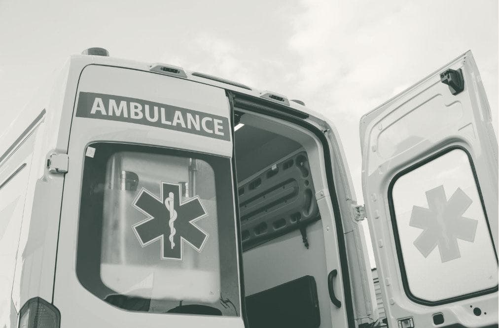 The open rear doors of an ambulance